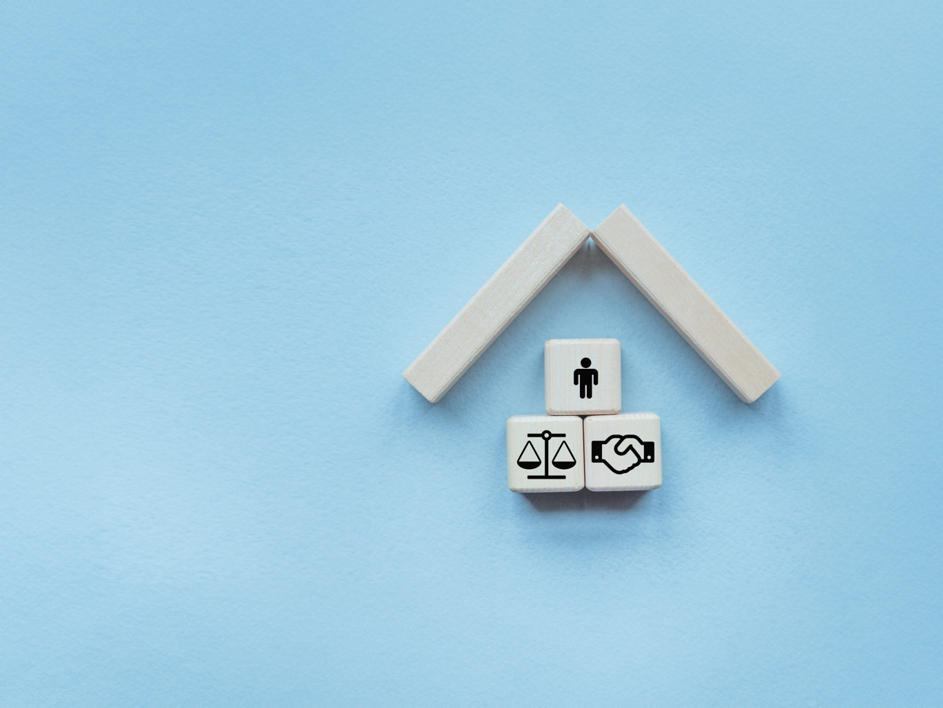 A building made of wooden objects. The concept of business, property and law.
